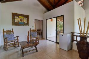 Posezení v ubytování Villa Bayacanes con piscinas privadas