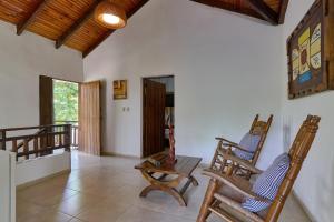 Posezení v ubytování Villa Bayacanes con piscinas privadas