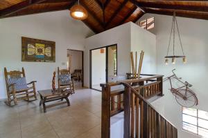 Posezení v ubytování Villa Bayacanes con piscinas privadas