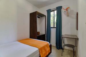 Postel nebo postele na pokoji v ubytování Villa Bayacanes con piscinas privadas