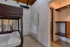 Postel nebo postele na pokoji v ubytování Villa Bayacanes con piscinas privadas