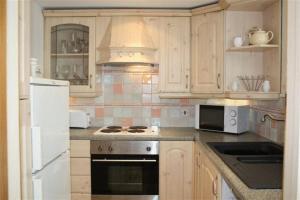 A kitchen or kitchenette at Robertsbridge Retreat At Cornhill Luxury Self Catering Apartments