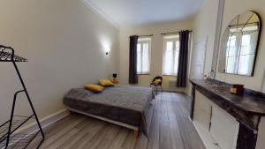 Posteľ alebo postele v izbe v ubytovaní Le Casimir - Appartement de standing 90m2 - Carcassonne centre