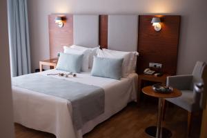 Postel nebo postele na pokoji v ubytování Hotel El Trebol + 26 fotografií