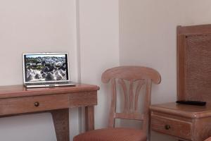 TV a/nebo společenská místnost v ubytování Hotel Donatello