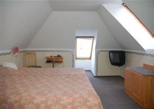 Voodi või voodid majutusasutuse Hotell De Tolly toas
