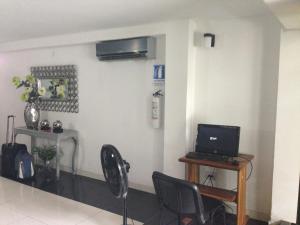 TV a/nebo společenská místnost v ubytování Hotel Sama + 11 fotografií