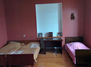 Letto o letti in una camera di GuestHouse Natali