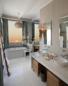 A bathroom at White Pearl Resorts