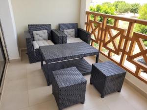 Posezení v ubytování Appartement avec piscine à saidia Climatisation et Wifi