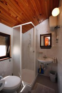 Kúpeľňa v ubytovaní Studio Murter 5102b