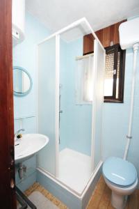 Kúpeľňa v ubytovaní Apartment Murter 5103a