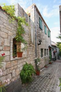 Fotografia z galérie ubytovania Holiday house with a parking space Murter - 5146 v Murteri
