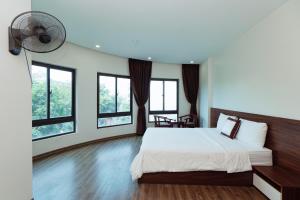 Postel nebo postele na pokoji v ubytování X9 Hotel