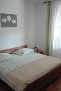 Posteľ alebo postele v izbe v ubytovaní Apartments with a parking space Murter - 5098 + 27 fotografií