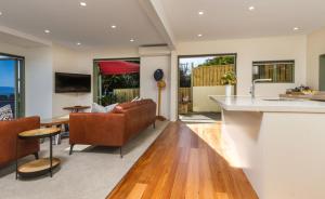 A television and/or entertainment centre at Harbour View - Two