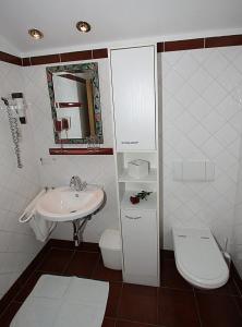 Kúpeľňa v ubytovaní Hotel Pension Alte Mühle