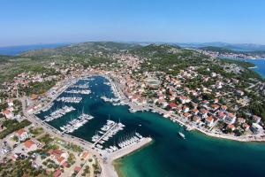 an aerial view of a harbor with boats in the water at Family friendly house with a swimming pool Jezera, Murter - 5124 in Jezera