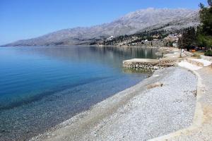 a large body of water with mountains in the background at Holiday house with a parking space Starigrad, Paklenica - 16126 in Starigrad