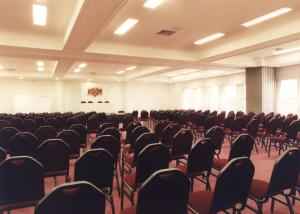 an empty conference room with chairs in it at Hotel Villa Michelon in Bento Gonçalves +43 photos