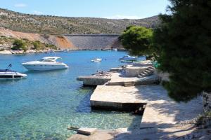 a group of boats in a body of water at Apartment Bilo 4189a in Podgreben +14 photos