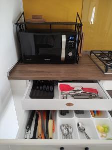 A kitchen or kitchenette at Casa Montefiore 13 LT nella tranquilla campagna Marchigiana