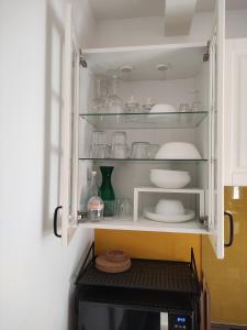 A kitchen or kitchenette at Casa Montefiore 13 LT nella tranquilla campagna Marchigiana