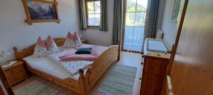 Postel nebo postele na pokoji v ubytování BioBauernhof Fresoldhof