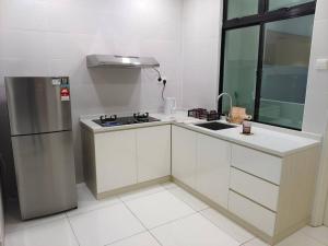 Kuchyň nebo kuchyňský kout v ubytování A2603 THE PLATINO NETFLIX PARADIGM MALL By STAY