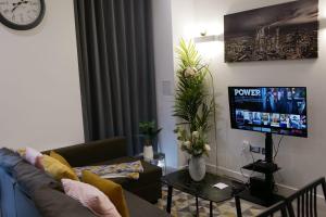 TV a/nebo společenská místnost v ubytování MK SHORTSTAY DELUXE-Flat 2