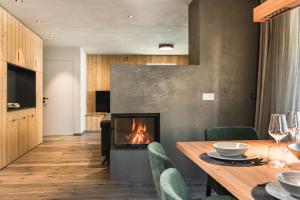 TV a/nebo společenská místnost v ubytování Amie Chalet