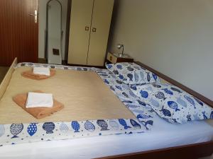 Posteľ alebo postele v izbe v ubytovaní Apartmani LuMa / apartman Luka