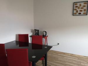 Príslušenstvo na prípravu kávy alebo čaju v ubytovaní Apartmani LuMa / apartman Luka