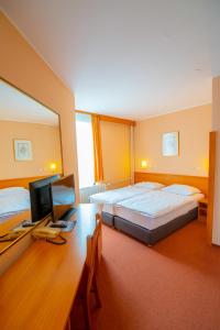 Katil atau katil-katil dalam bilik di Hotel Park