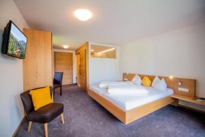 Postel nebo postele na pokoji v ubytování Hotel juenmi