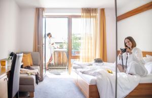 Postel nebo postele na pokoji v ubytování Hotel juenmi