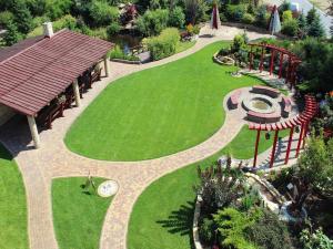 an aerial view of a garden with a park at Hotel Sevilla in Rawa Mazowiecka