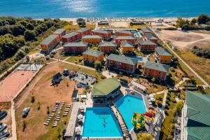 an aerial view of a resort with a swimming pool at Villas for 4 or 6 Adults in Therma Village - Private Beach & Free Parking in Kranevo