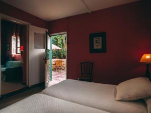 Postel nebo postele na pokoji v ubytování Hotel Rural La Casa Amarilla