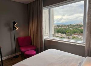 Postel nebo postele na pokoji v ubytování QS Marista - Studio Alessandra Antonelli - Flat 1708 + 21 fotografií