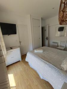 Posteľ alebo postele v izbe v ubytovaní Hotel Posada del Mar