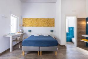 Postel nebo postele na pokoji v ubytování I Gelsomini Guest House