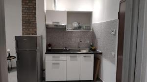 Кухня или мини-кухня в Il Gelsomino
