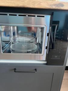 Kuchyňa alebo kuchynka v ubytovaní Apartament No. 26 Nad Iławką