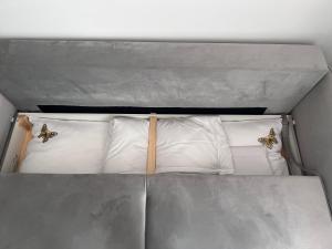 Posteľ alebo postele v izbe v ubytovaní Apartament No. 26 Nad Iławką