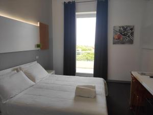 Letto o letti in una camera di Oasis Park Hotel