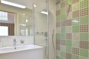 A bathroom at TI Hotel