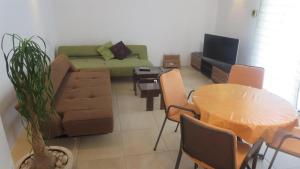 TV a/nebo společenská místnost v ubytování Apartments Orhideja