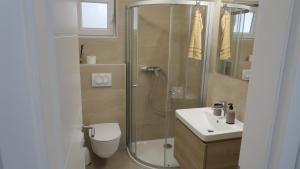 Koupelna v ubytování Apartments Orhideja