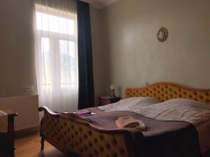 Letto o letti in una camera di Family Hotel 7 Sisters